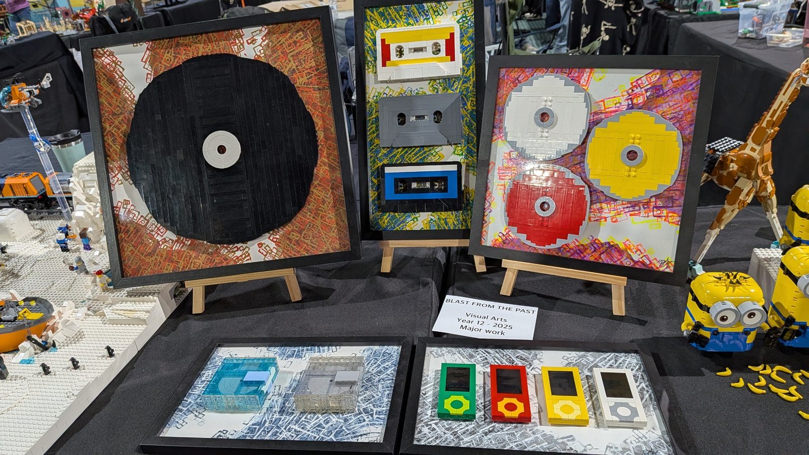 Framed brick-built records, cassettes, CDs and music players